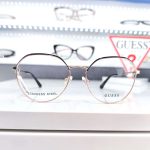 Okrugle Guess metalne naocare zlatne sa crnim gornjim delom